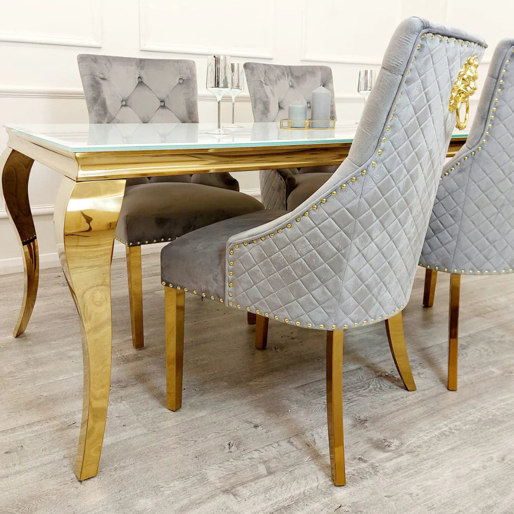 Louis Gold Marble Dining Table with 4 Bentley Lion Knocker Velvet Chairs - Furniture Network