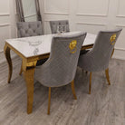 Louis Gold Marble Dining Table with 4 Bentley Lion Knocker Velvet Chairs - Furniture Network