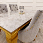 Louis Gold Marble Dining Table with 4 Bentley Lion Knocker Velvet Chairs - Furniture Network